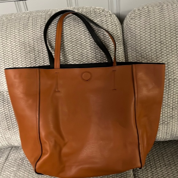 Handbags - Over size brown leather bag.